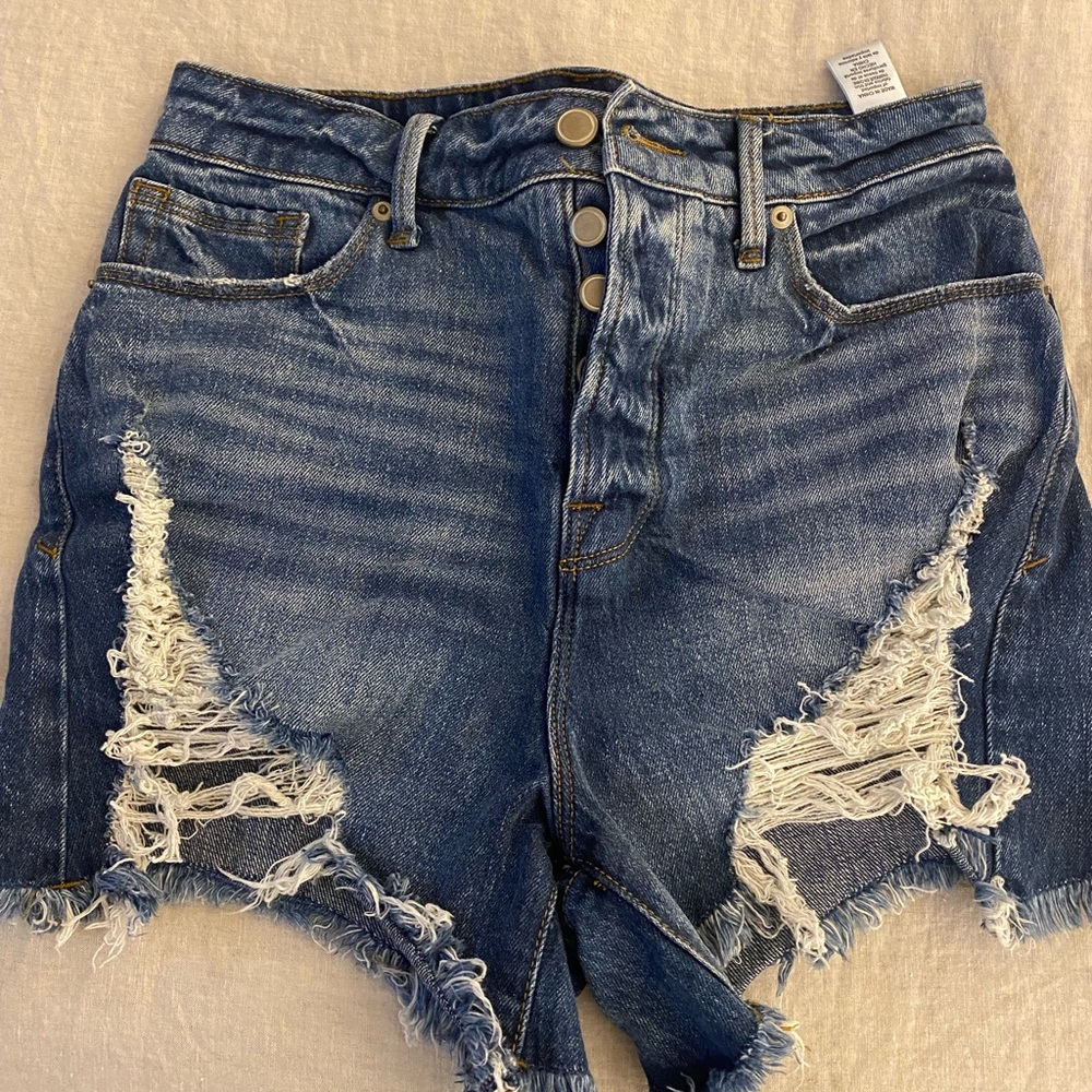 Good American denim cut offs. Super cute with shredded detail.